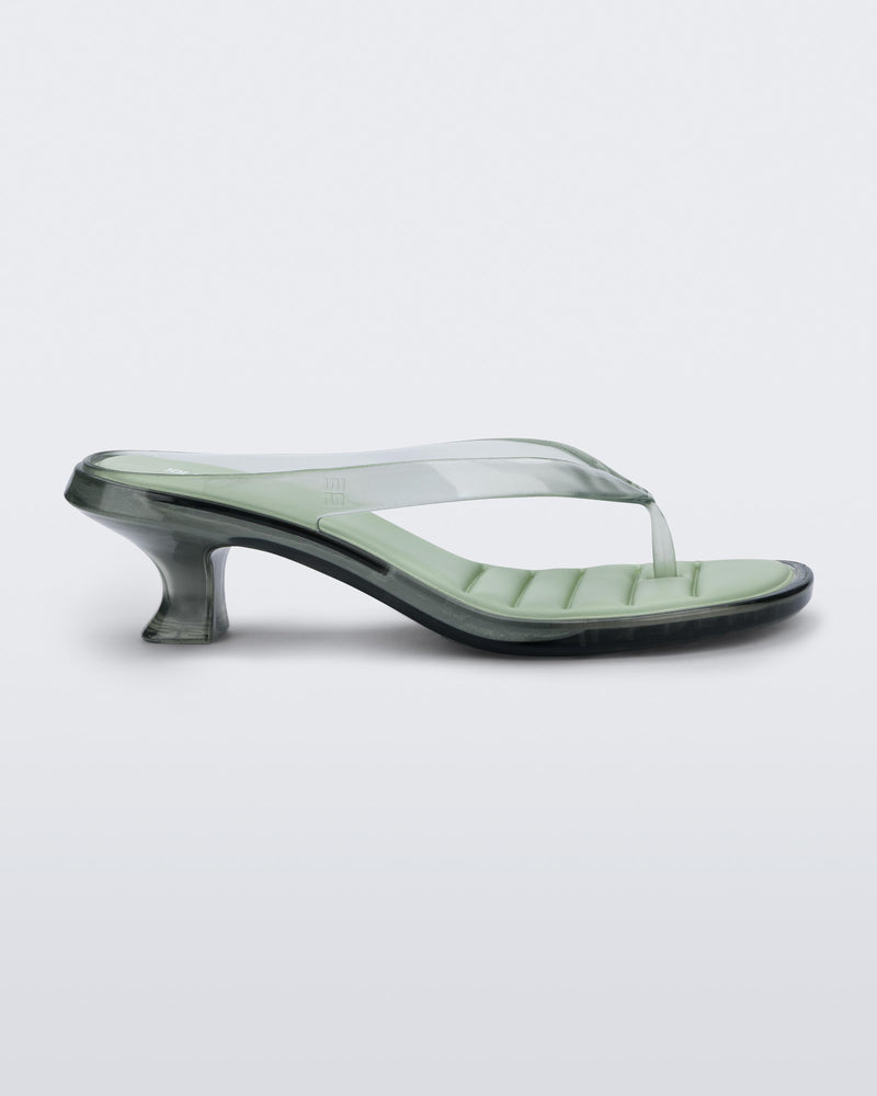 Side view of a transparent green Flip Flop Kitten Heels