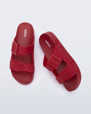 Top view of a pair of red Cozy Connection slides