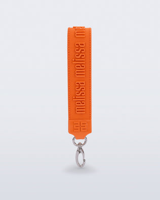 Front view of an orange M Lover Charm with the Melissa logo