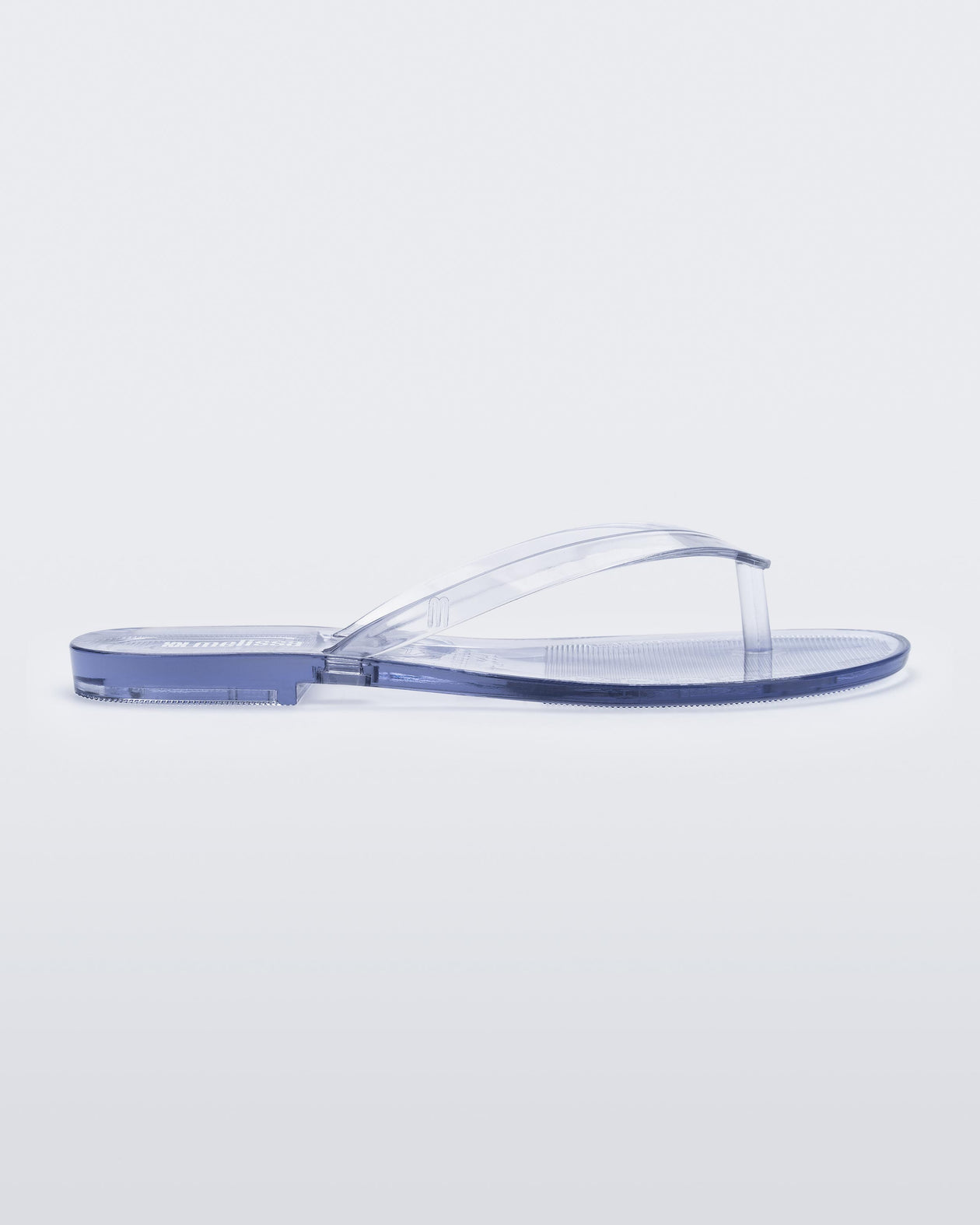 Side view of a clear Harmonic Jelly flip flop