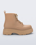Side view of a matte beige Coturno Soft Platform boot