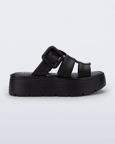 Side view of a black Pump Platform sandal