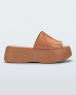 Side view of the Melissa Becky platform slide in beige