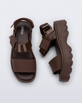 Top and side view of a pair of brown Kick Off Sandals