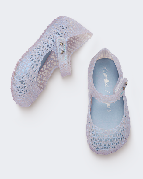 Top and side view of a pair of Mini Melissa Campana ballet flats in clear
