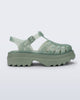 Side view of a green Possession Platform II sandal.
