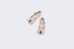 Top view of a pair of beige Ultragirl Sweet X baby flats