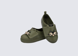 Angled view of a pair of green Jelly Pop Safari baby sneakers