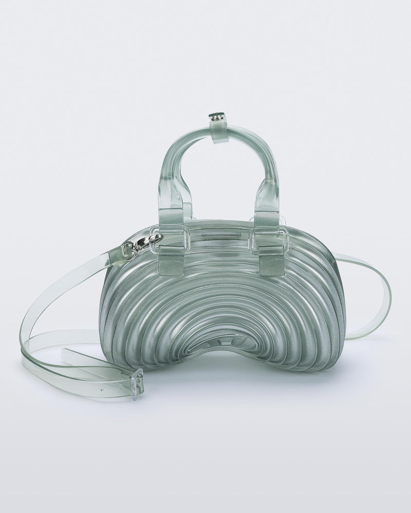 Front view of a  transparent blue Quantum Dome + Diesel bag with hand strap and shoulder strap