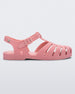 Side view of a pink flocked Melissa Possession Velvet sandal.