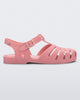 Side view of a pink flocked Melissa Possession Velvet sandal.