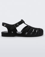 Side view of a black flocked Melissa Possession Velvet sandal.