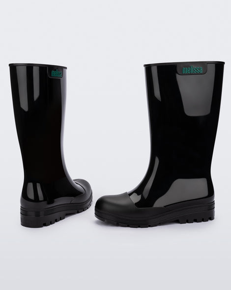Back and side view of a pair of black Melissa Welly boots.
