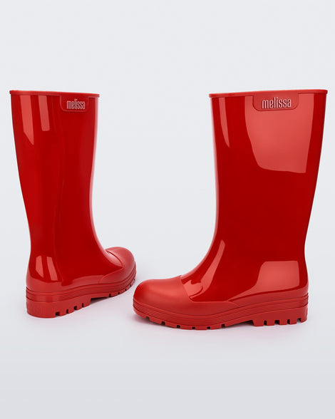 Back and side view of a pair of red Melissa Welly boots.