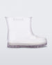 Side view of a clear baby Melissa Welly boot.