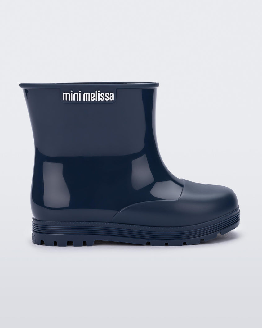 Side view of a blue baby Melissa Welly boot.