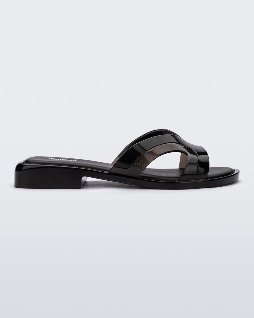 Side view of a black Melissa Yacht Slide.