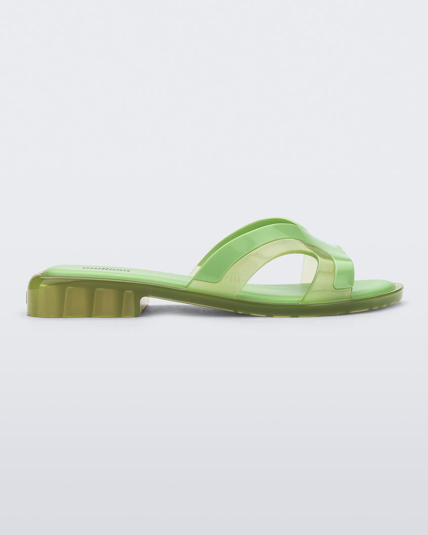 Side view of a green Melissa Yacht Slide.