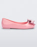 Side view of a pink Mini Melissa Sweet Love kids flat with a metallic pink bow.