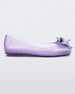 Side view of a lilac Mini Melissa Sweet Love kids flat with a metallic lilac bow.