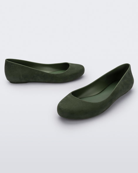 Angled view of a pair of green flocked Melissa Sweet Love Basic Velvet flats.