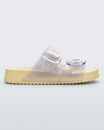 Side view of pearly yellow Cozy slide with two buckle straps.