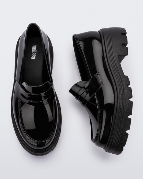 Top and side view of a pair of Melissa Royal platform loafers in Black