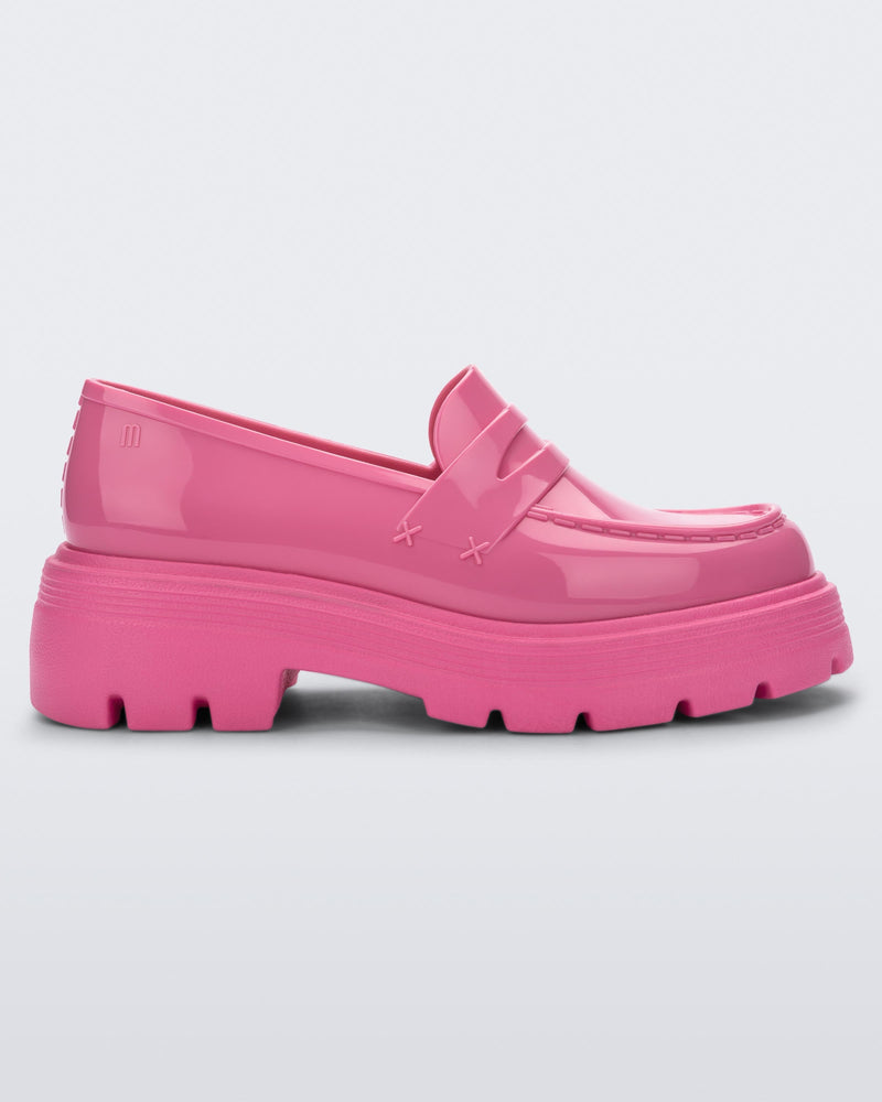 Side view of a Melissa Royal platform loafer in Pink