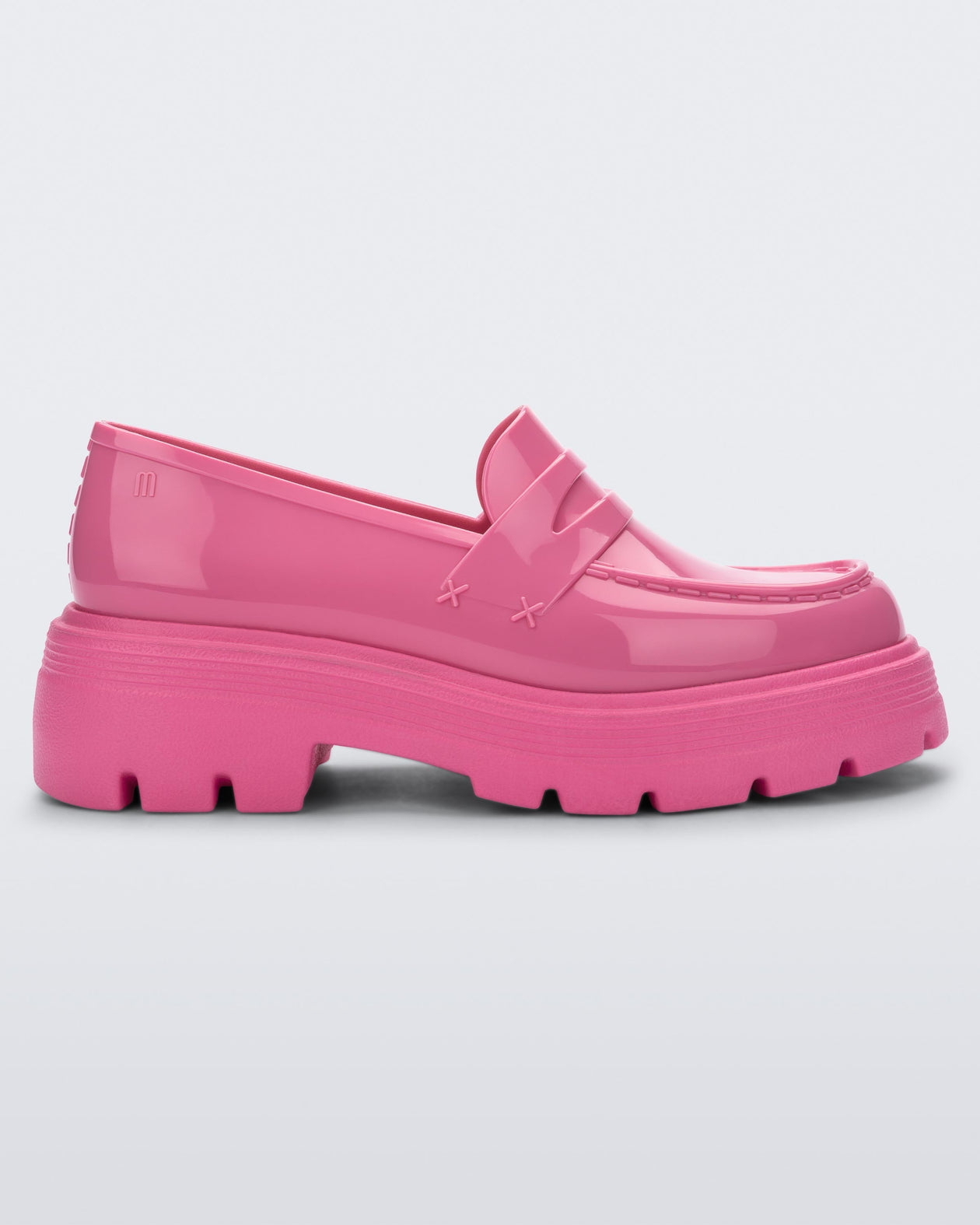 Side view of a Melissa Royal platform loafer in Pink