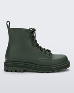 Side view of a green kids Melissa Coturno boot.