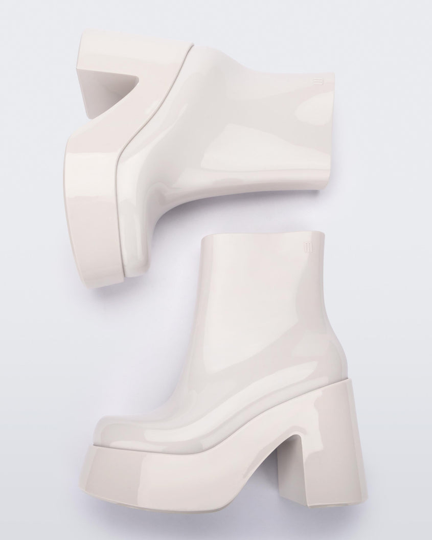 Top view of a pair of white Melissa Nubia  platform heel boots.