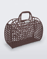 Angled view of a brown Refraction bag with handles