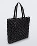 Angled view of a black Melissa Mogu + Hikaru Matsumura bag