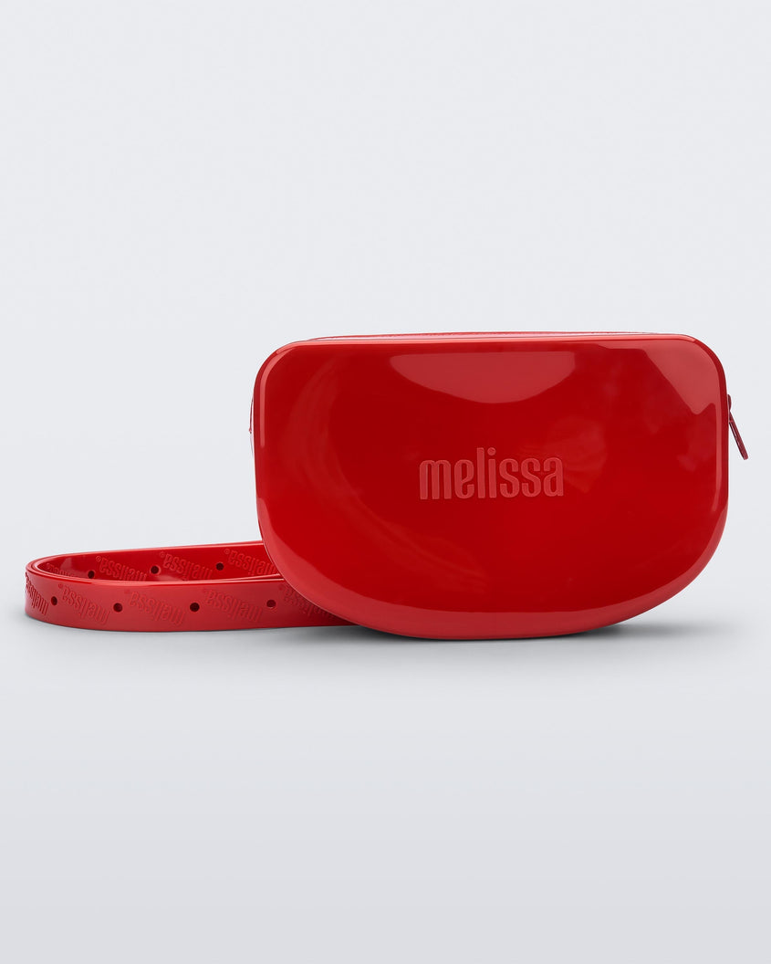 Front view of the red Melissa Go Easy Bag with strap