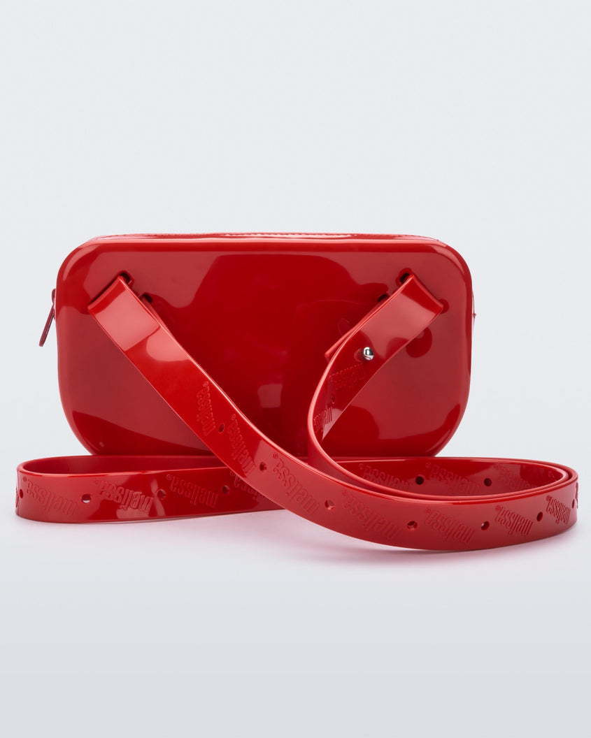 Back view of the red Melissa Go Easy Bag with strap