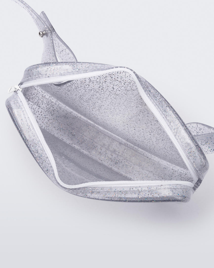 Top view of the glitter clear Melissa Go Easy Bag with strap