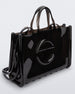 Angled view of a black large Melissa Jelly Shopper bag + Telfar bag with a handle and straps.