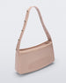 Angled view of the pink Melissa Baguete Studs bag with a short studded strap.
