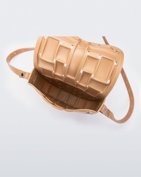 Inside view of a beige Possession Bag with strap.