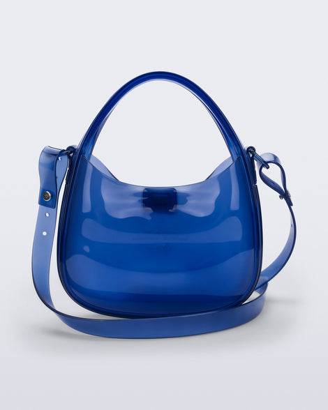 Back view of a clear blue Mirror bag with cross body straps two clear handles.