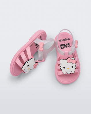 Side view of a pink Hip + Hello Kitty and Friends sandal with white ankle strap and Hello Kitty on upper