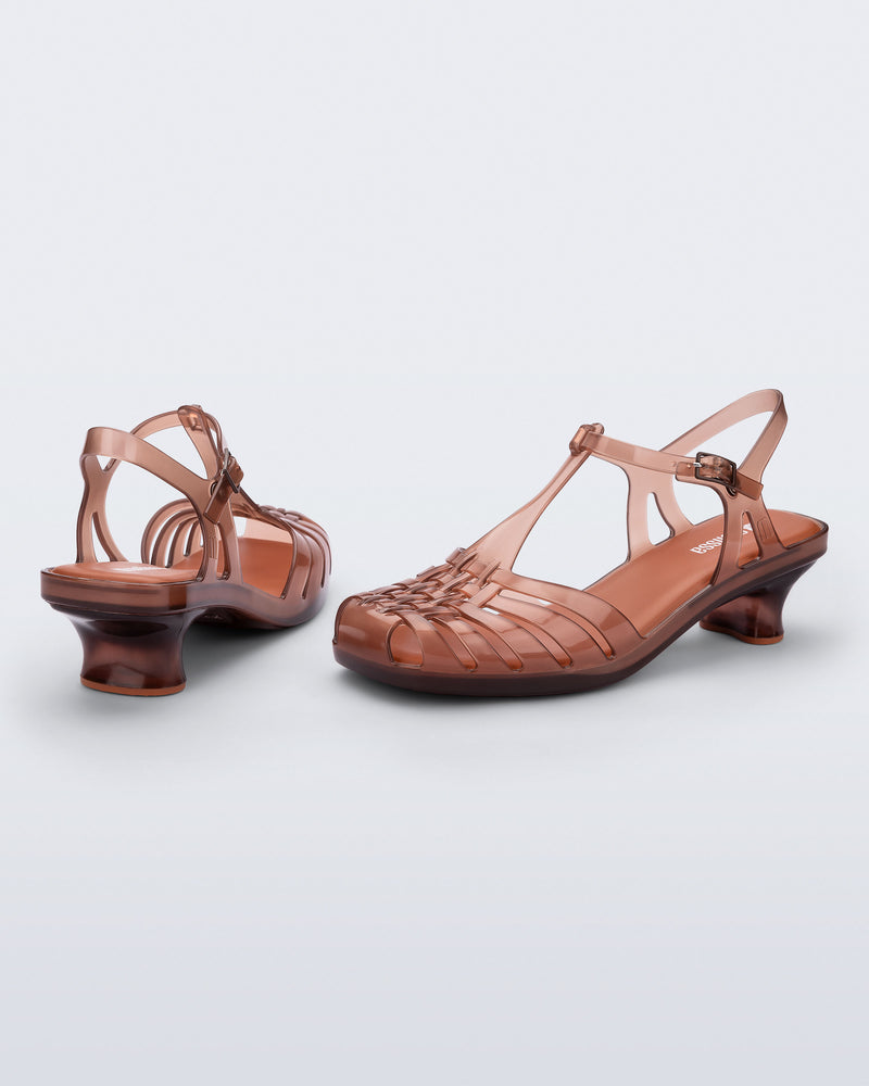 Back and side view of a pair of clear brown Vixen Kitten Heel sandals