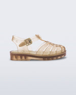 Side view of a clear beige Possession baby sandal