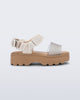 Side view of a beige/glitter kids Kick Off Sandal