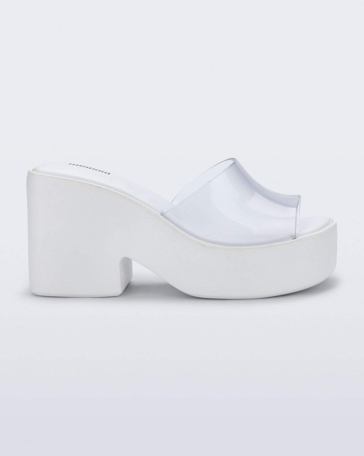 Side view of a white with clear upper Posh platform heel sandal