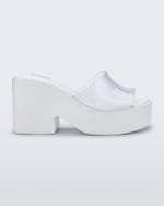 Side view of a white with clear upper Posh platform heel sandal