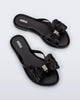 Top view of a pair of black Slim Flip Flops with bow
