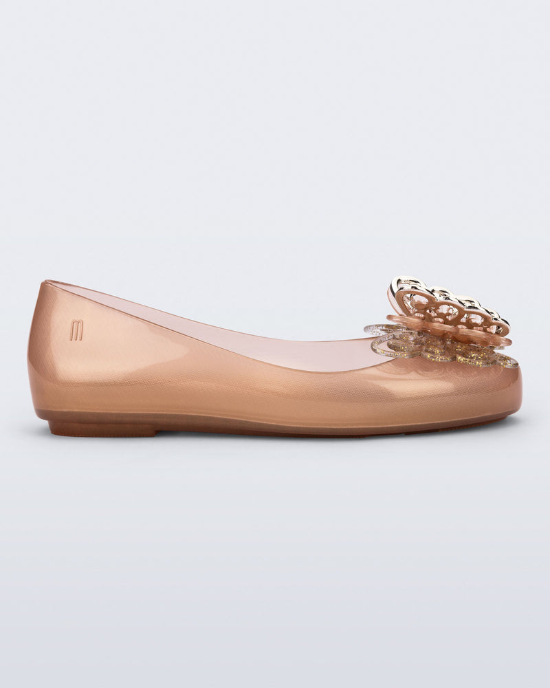 Side view of a gold Sweet Love Butterfly kids flats.