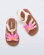 Top view of a pair of pink Hip Bloom kids sandals with pink flower 