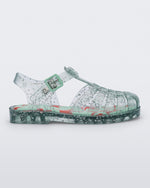 Side view of a clear green star glitter Possession kids fisherman sandal